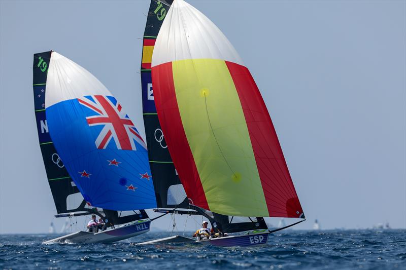 Isaac McHardie and Will McKenzie (NZL) - Silver Medalists trail the Gold Medalists Diego Botin and Paul Trittel (ESP) - Mens Skiff - Paris2024 Olympic Sailing Event - Marseille - August 2, 2024 - photo © World Sailing / Lloyd Images