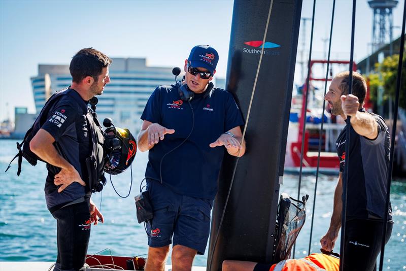 Dean Barker talks to Maxime Bachelin (L) and Arnaud Psarofaghis (R) after the practice in Barcelona, Spain - photo © Alinghi Red Bull Racing