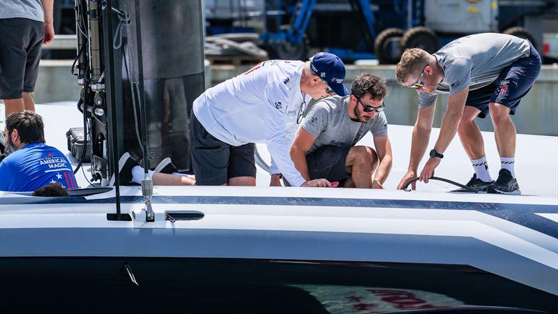 Working on the jib traveller and fairing - American Magic - AC75 - Day 22 - June 18, 2024 - Barcelona - photo © Ugo Fonolla / America's Cup