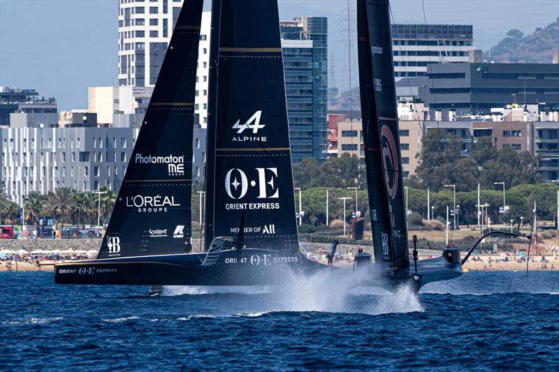 Orient Express leads Alinghi Red Bull Racing - Louis Vuitton Cup - Day 1 - Barcelona - August 29, 2024 photo copyright Ian Roman / America's Cup taken at Real Club Nautico de Barcelona and featuring the AC75 class