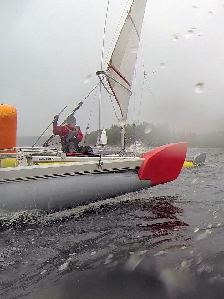 Catapult TT at Kielder Water - Wet, wet, wet: a rain-spattered John Terry (red bowboard) attacks Stuart Ede as they round the bottom mark photo copyright John Terry taken at Kielder Water Sailing Club and featuring the Catapult class