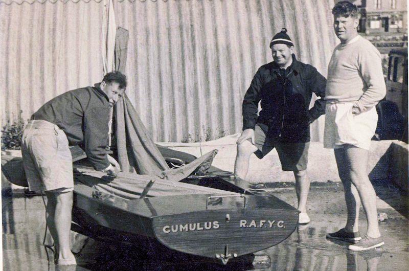 Ian Proctor bending over his Merlin Rocket with Beecher Moore (in the white shorts) watching on - photo © MROA