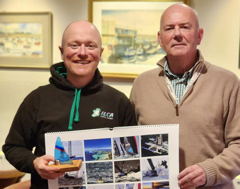 ILCA 7s, 3rd Overall, Hugh Delap with DMYC Commodore, Derek Gill. Viking Marine Frostbites Series Series 1 prize-giving photo copyright Frank Miller taken at Dun Laoghaire Motor Yacht Club and featuring the Dinghy class