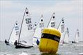 Alex Scoles leads the fleet to the windward mark in his Idol Composites boat during the Europe UK Nationals at Hayling Island © Robert Deaves / www.robertdeaves.uk