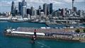 Switzerland SailGP Team helmed by Sebastien Schneiter sails past the spectators watching from the grandstands on Race Day 1 of The Rolex SailGP Championship ITM New Zealand Sail Grand Prix in Auckland, New Zealand