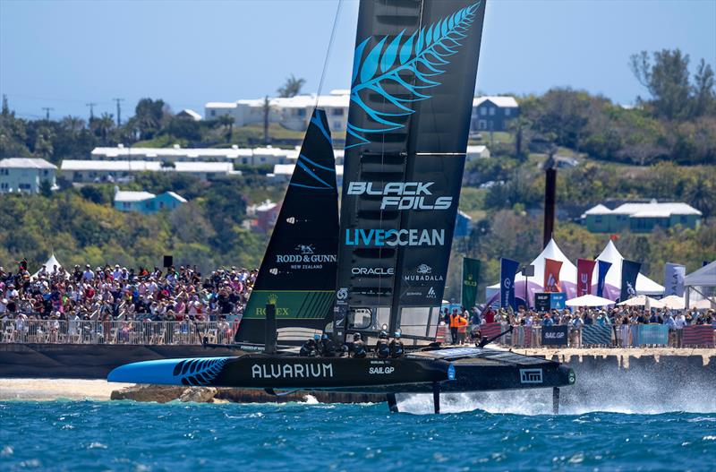 New Zealand SailGP Team helmed by Peter Burling passes the grandstand and Race Stadium on Race Day 1 of the Apex Group Bermuda Sail Grand Prix in Bermuda - photo © Samo Vidic for SailGP