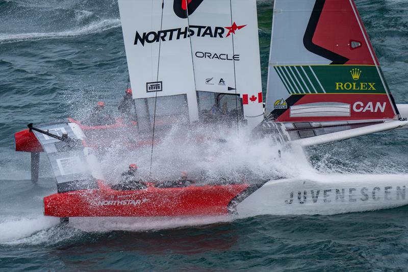 Canada NorthStar SailGP Team helmed by Giles Scott hit a wave during a practice session ahead of the Rolex SailGP Championship ITM New Zealand Sail Grand Prix in Auckland, New Zealand photo copyright Bob Martin for SailGP taken at  and featuring the F50 class