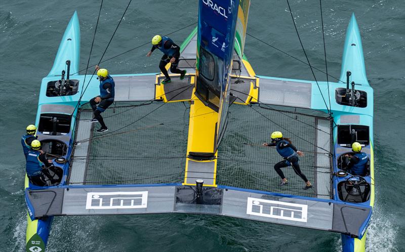 Martine Grael, driver of Mubadala Brazil SailGP Team, crossses the boat during a manoeuvre on Race Day 2 of The Rolex SailGP Championship ITM New Zealand Sail Grand Prix in Auckland photo copyright Bob Martin for SailGP taken at  and featuring the F50 class