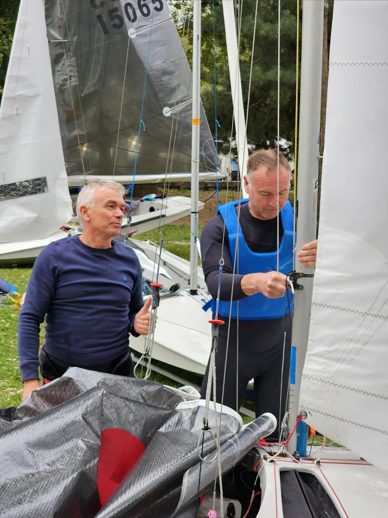 DJ and Vyv doing a bit of boat tuning during a postponement on day 2 of the Fireball Europeans at Maccagno photo copyright Frank Miller taken at Unione Velica Maccagno and featuring the Fireball class