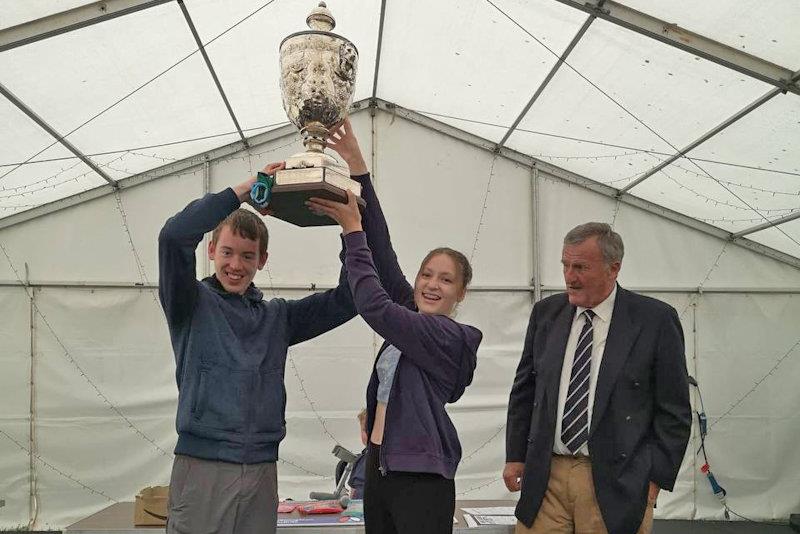 Patrick Hill and Amelia Gaye lift the Mount Haes Trophy - NSSA National Youth Regatta at Bassenthwaite photo copyright Terry Crawley taken at Bassenthwaite Sailing Club and featuring the Firefly class