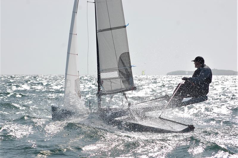 Alistair Warren breaks the Maas/Wood stranglehold on race wins on day 5 of the International Canoe Worlds at Pwllheli photo copyright David Henshall taken at Plas Heli Welsh National Sailing Academy and featuring the International Canoe class