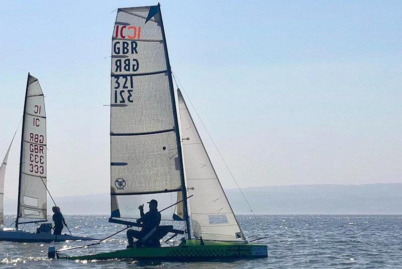 Pete Smith chasing leader Liz Potter in the final pursuit race - International Canoe 'Not the Nationals' at West Kirby photo copyright Dan Skinner taken at West Kirby Sailing Club and featuring the International Canoe class