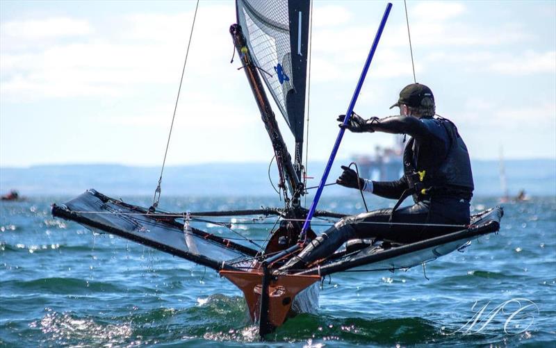 George finely balanced during the International Moth Lowriders Scottish Nationals at Largo Bay - photo © Max Campbell