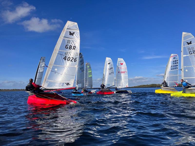 A crowded Pin End start during the International Moth Lowriders `Burton Rinse Cycle` Inlands photo copyright Paul Kelly taken at Burton Sailing Club and featuring the International Moth class