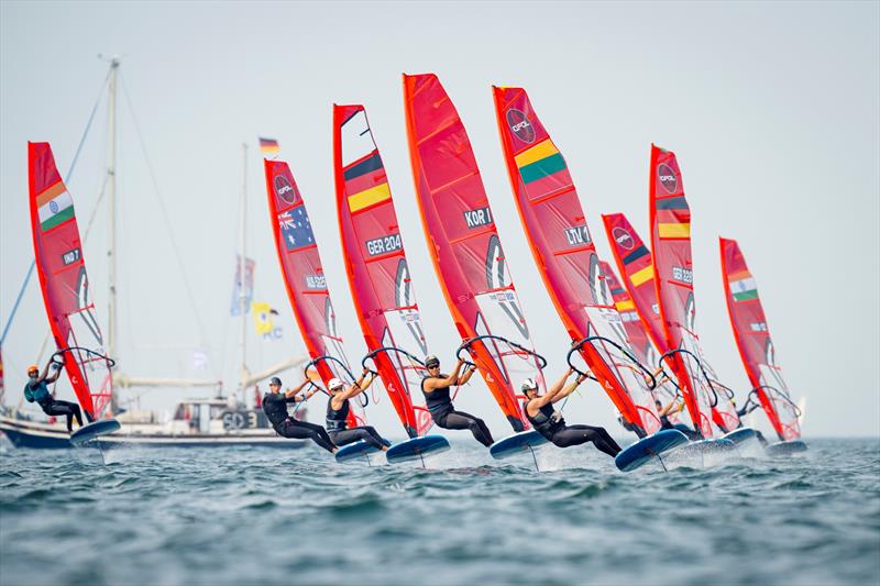 The sailors of the spectacular iQFOiL class fly over the Kiel Fjord photo copyright Sascha Klahn taken at Kieler Yacht Club and featuring the iQFoil class