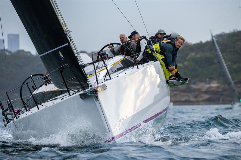 Bacchanal's crew hiking hard in Sydney Harbour photo copyright CYCA | Ashley Dart taken at Cruising Yacht Club of Australia and featuring the IRC class