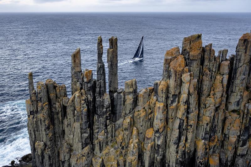 LawConnect passing the iconic Organ Pipes in the 2023 Rolex Sydney Hobart photo copyright Rolex | Kurt Arrigo taken at Australian 18 Footers League and featuring the IRC class