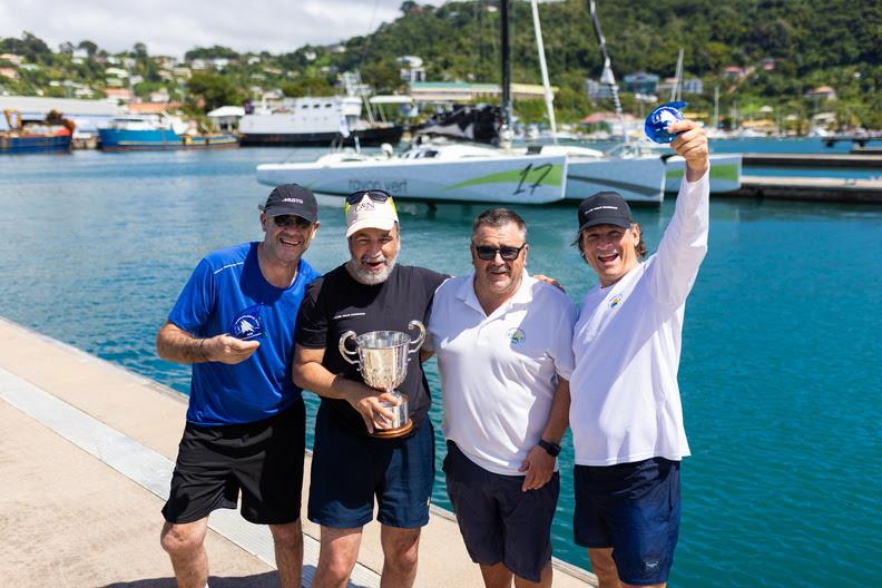 Multihull Line Honours Trophy for Oran Nataf and crew, presented by RORC Racing Manager Steve Cole - 2025 RORC Transatlantic Race - photo © Arthur Daniel / RORC