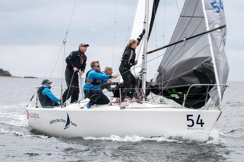 Mike Ingham's team on J/24 Worlds day 2 at Boltenhagen, Germany photo copyright Pepe Hartmann / J/24 worlds taken at Norddeutscher Regatta Verein and featuring the J/24 class