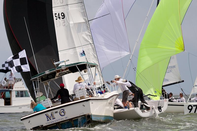 A J/70 and its crew get tangled up with the anchor line of a race committee boat at Sperry Charleston Race Week 2017 - photo © Charleston Race Week / Meredith Block