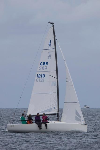 Sam Hall and crew on Mojito Bach, joining in the fancy dress at the Pwllheli Regatta by all wearing women's floral print dresses - photo © Paul Jenkinson