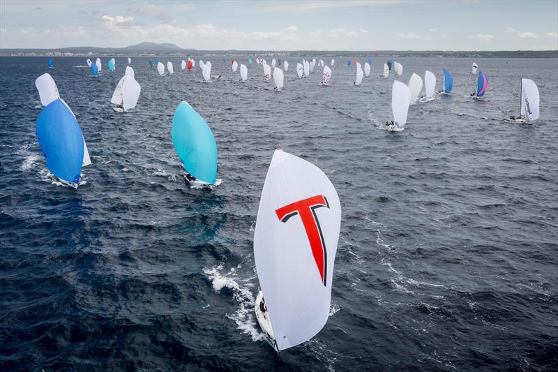 The fleet downwind on day 1 of the Sandberg Estates J/70 Worlds in Palma photo copyright SailingShots by María Muiña taken at Real Club Náutico de Palma and featuring the J70 class