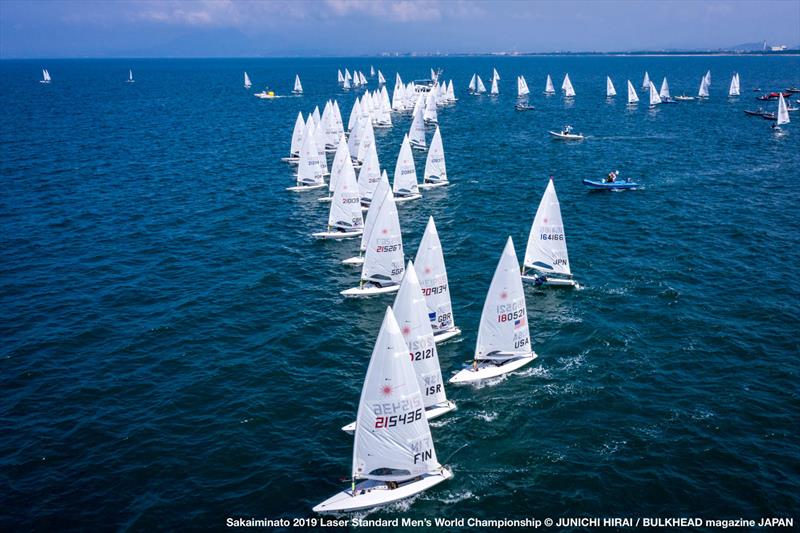 Start line on day 1 of the ILCA Laser Standard Men's World Championship photo copyright Junichi Hirai / Bulkhead Magazine Japan taken at  and featuring the ILCA 7 class