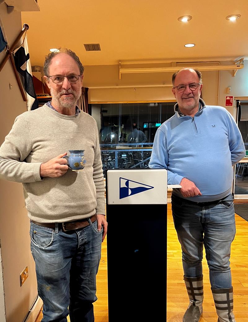 Dun Laoghaire Frostbites Series 1: Roy McKay (ILCA 7, Race 1) receives his Frostbite Mug from RO Cormac Bradley photo copyright Alyson Orr taken at Dun Laoghaire Motor Yacht Club and featuring the ILCA 7 class