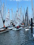 An on-water traffic jam on Saturday during Kieler Woche when five fleets are released to launch at once © Martin Pascoe