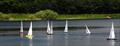 GAMES 6 Nylet RM Challenge Trophy: the fleet approaching the windward mark with Lewis leading the pack in a turbulent wind with very strong gusts © Roger Stollery