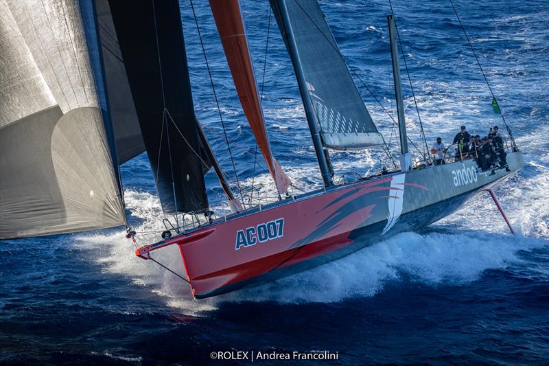 Andoo Comanche surges towards the finish for the boat's fourth Line Honours win in the Rolex Sydney Hobart - photo © Rolex / Andrea Francolini