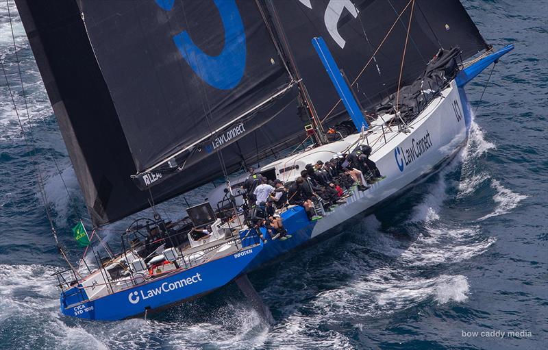 LawConnect leads the fleet heading south photo copyright Bow Caddy Media taken at Cruising Yacht Club of Australia and featuring the Maxi class