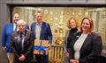 Alderman JP Smith receives his honorary Royal Cape Yacht Club in front of the Lipton Challenge Cup trophy cabinet. (Seen from left to right): William Crockett, Dave Hudson, Alderman JP Smith, Toni Mainprize and Kerry Pryde © Royal Cape Yacht Club