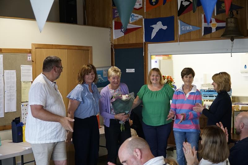 Kippford Week Galley Girls! Scott McColm presents Club Social Secretary Liz Train with a boquet with the ladies who did much for the social events, Fiona, Liz, Brydie, Lindsey and Linda - photo © Finlay Train