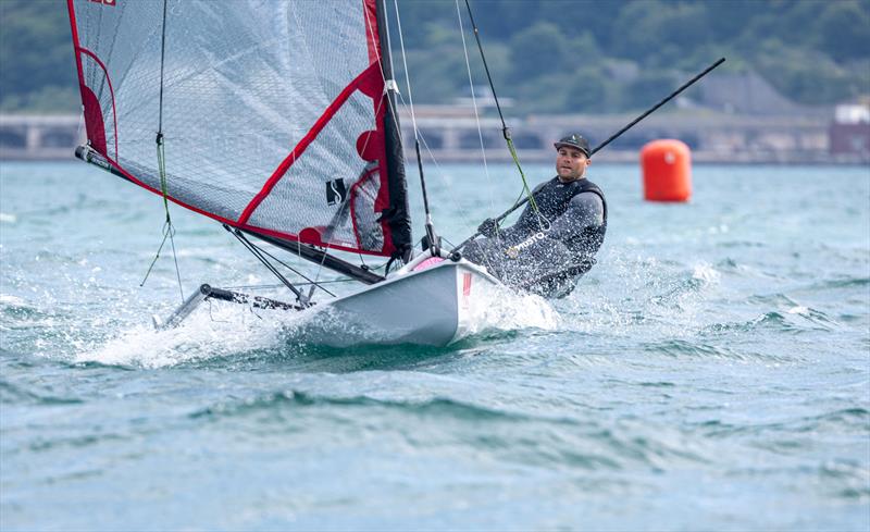 Bill Maughan on day 2 of the ACO 13th Musto Skiff 2024 Worlds at the WPNSA photo copyright Michael Oliver taken at Weymouth & Portland Sailing Academy and featuring the Musto Skiff class