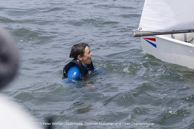 Joel Beashel celebrating with a swim after an emphatic national title victory - 2020 Musto Optimist Australian and Open Championship - photo © Peter Withiel