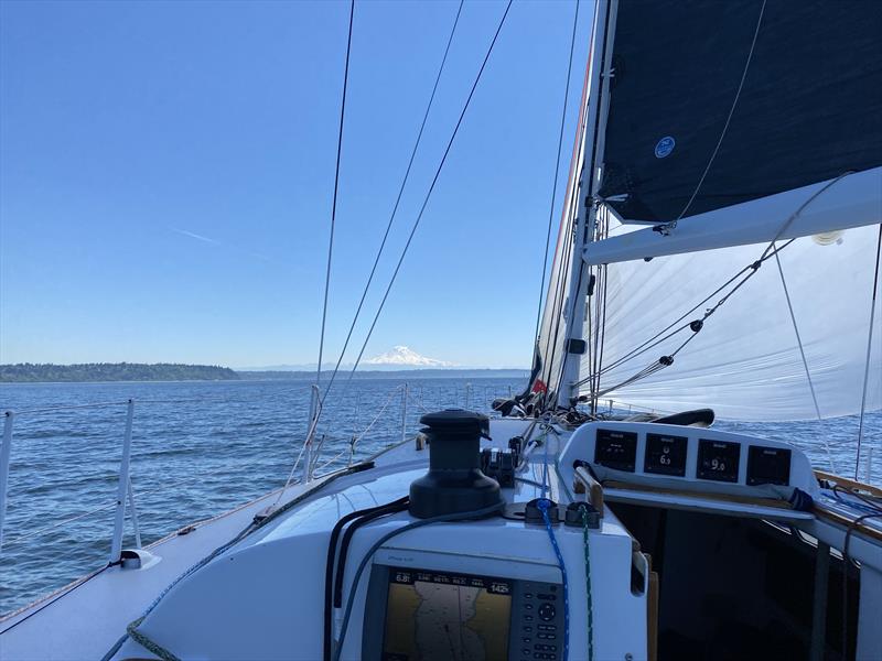 Mount Rainier makes its presence known as Dark Star nears Point Robinson Lighthouse on the 2024 Vashon Island Race - photo © David Schmidt