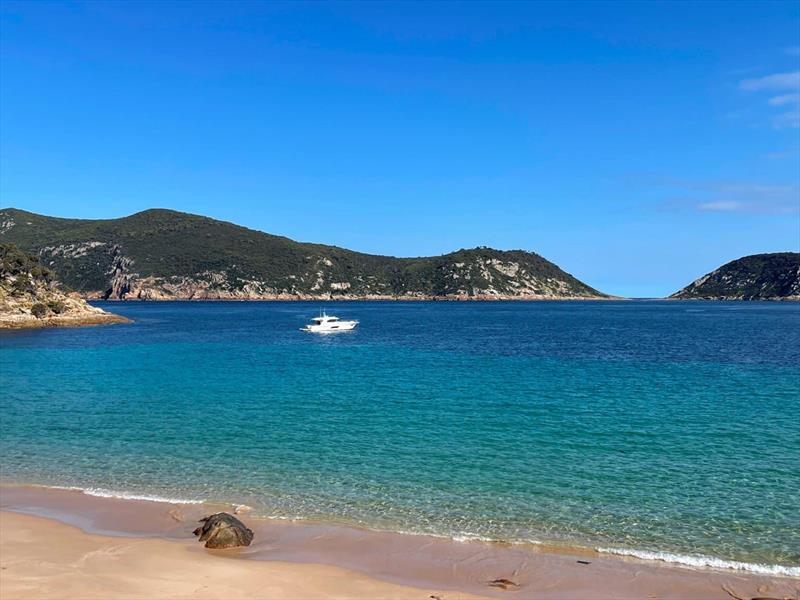 Ian Hall's sporty 445 SUV, Devocean 2, anchored in the crystal, clear waters off Deal Island photo copyright Riviera Australia taken at  and featuring the Power boat class