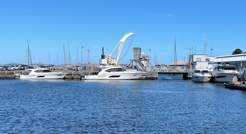 The convoy of Rivieras turned plenty of heads as they explored Tasmania's local waterways including here at Constitution Dock in Hobart, where they were granted special permission to moor photo copyright Riviera Australia taken at  and featuring the Power boat class