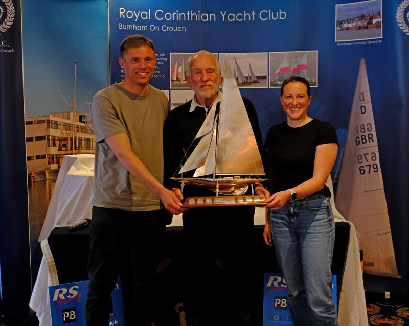 Edwin Buckley (event director and race officer) presents Oliver Groves and Esther Parkhurst with the Endeavour Trophy photo copyright Roger Mant Photography taken at Royal Corinthian Yacht Club, Burnham and featuring the RS200 class