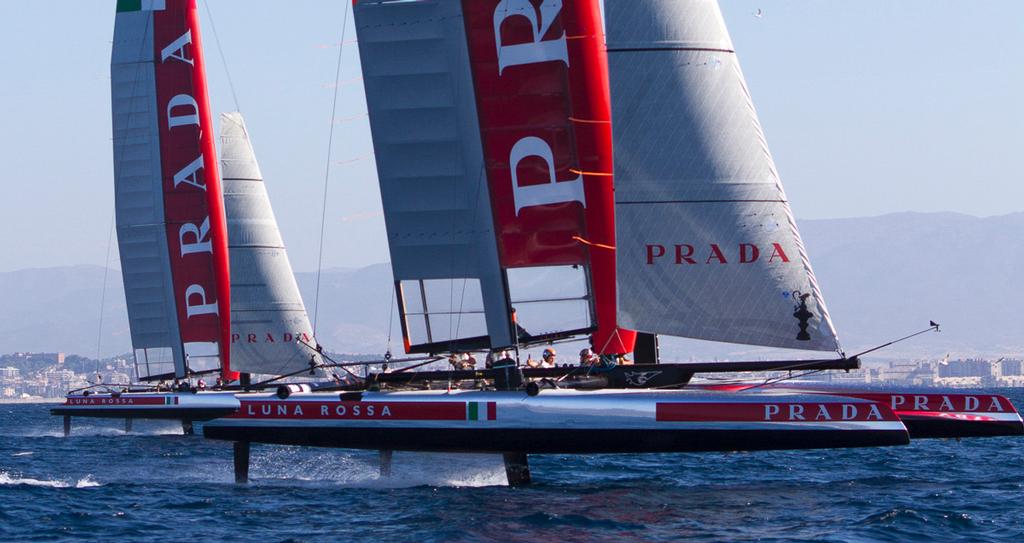 Luna Rossa's two foiling AC45's Piranha and Swordfish foiling off the team's base in Cagliari, Italy photo copyright Luna Rossa Challenge 2013 http://www.lunarossachallenge.com/ taken at  and featuring the  class