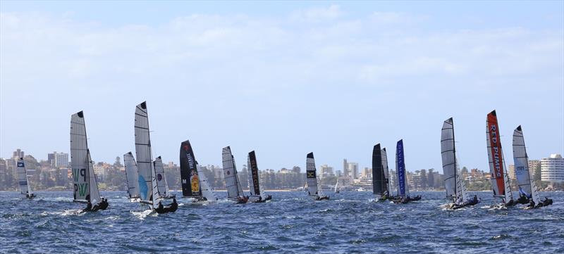 Manly 16ft Skiff Club Championship Heat 3 photo copyright SailMedia taken at Manly 16ft Skiff Sailing Club and featuring the 16ft Skiff class