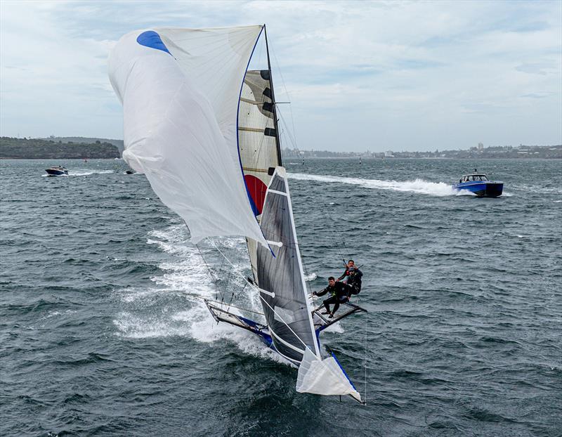 A costly torn spinnaker for the Yandoo team  photo copyright SailMedia taken at Australian 18 Footers League and featuring the 18ft Skiff class