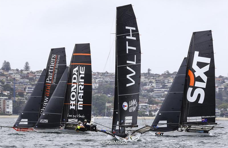 Winnings 2025 JJ Giltinan 18ft Skiff Championship Races 3 & 4: Starboard tackers crossing upwind photo copyright SailMedia taken at Australian 18 Footers League and featuring the 18ft Skiff class