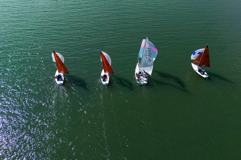 Close finish during Burnham Week 2024 photo copyright Petru Balau Sports Photography / sports.hub47.com taken at Royal Corinthian Yacht Club, Burnham and featuring the Squib class