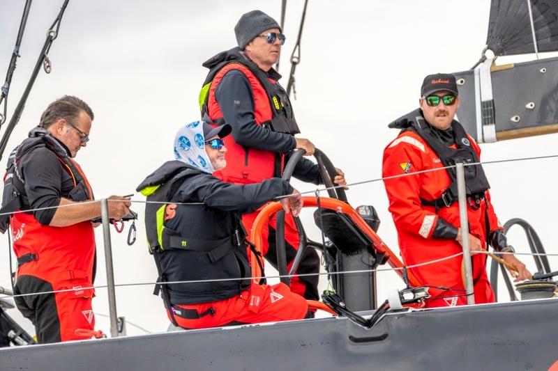 Christian Zugel at the helm of Tschüss 2 in the 2024 Roschier Baltic Sea Race photo copyright Pepe Korteniemi / www.photex.fi taken at Royal Ocean Racing Club and featuring the Volvo 70 class