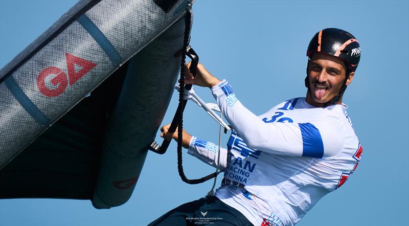 Romain Ghio happy to get through the day with some good scores - 2024 WingFoil Racing World Cup China, Day 2 photo copyright IWSA media / Robert Hajduk taken at  and featuring the Wing Foil class