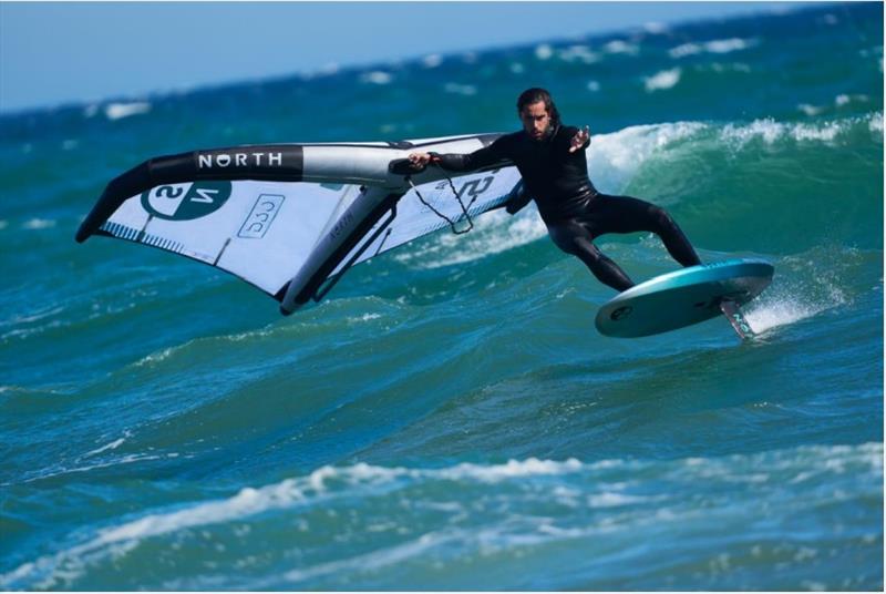 Lumps and bumps, cranking turns and riding waves. Fabi Muhmentahler surfs the turquoise 2025 Swell photo copyright Andy Troy taken at  and featuring the Wing Foil class